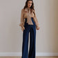 Dark blue palazzo pants with a corset belt