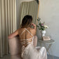 Beige dress-combination with an open back