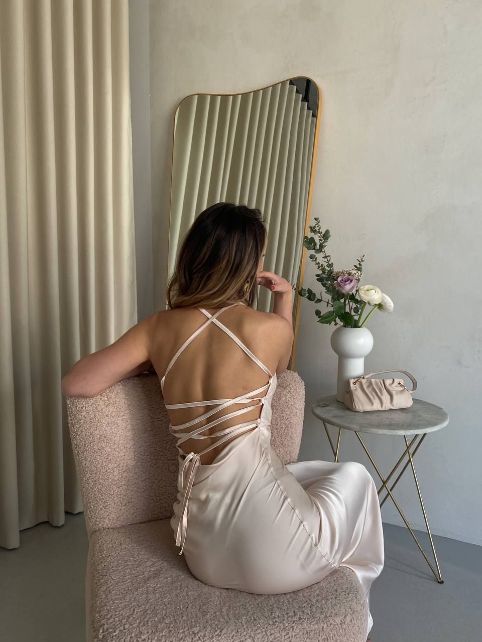 Beige dress-combination with an open back