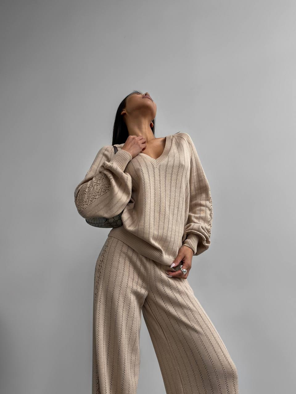 Beige knitted suit