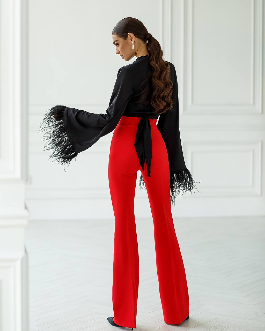 Red flared pants with a super high fit