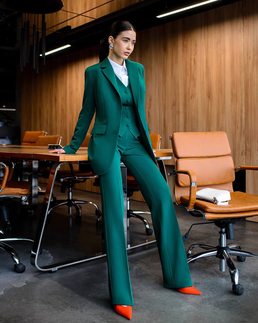 Green three-piece suit with waistcoat and straight trousers