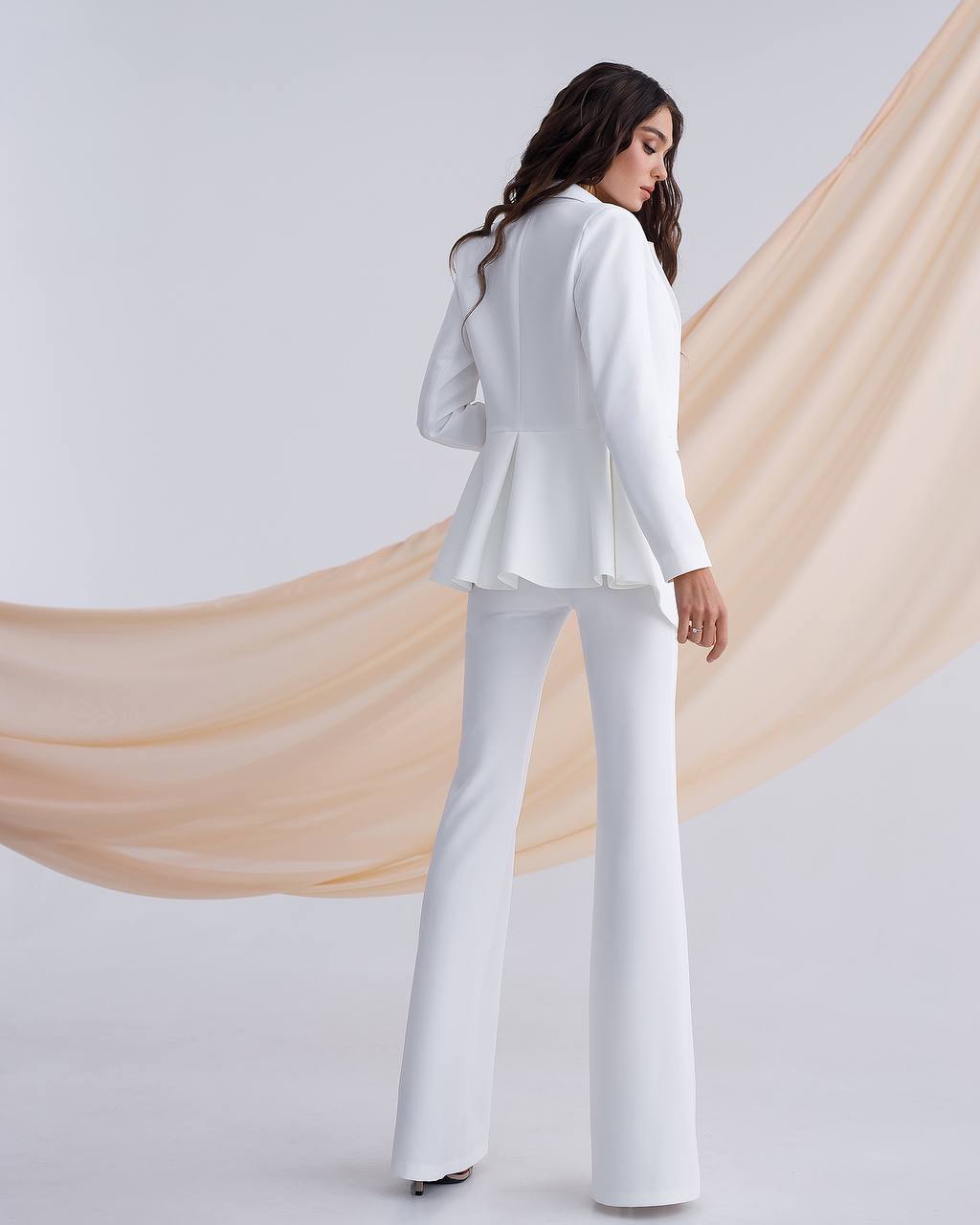 Milk suit with a peplum jacket and flared pants