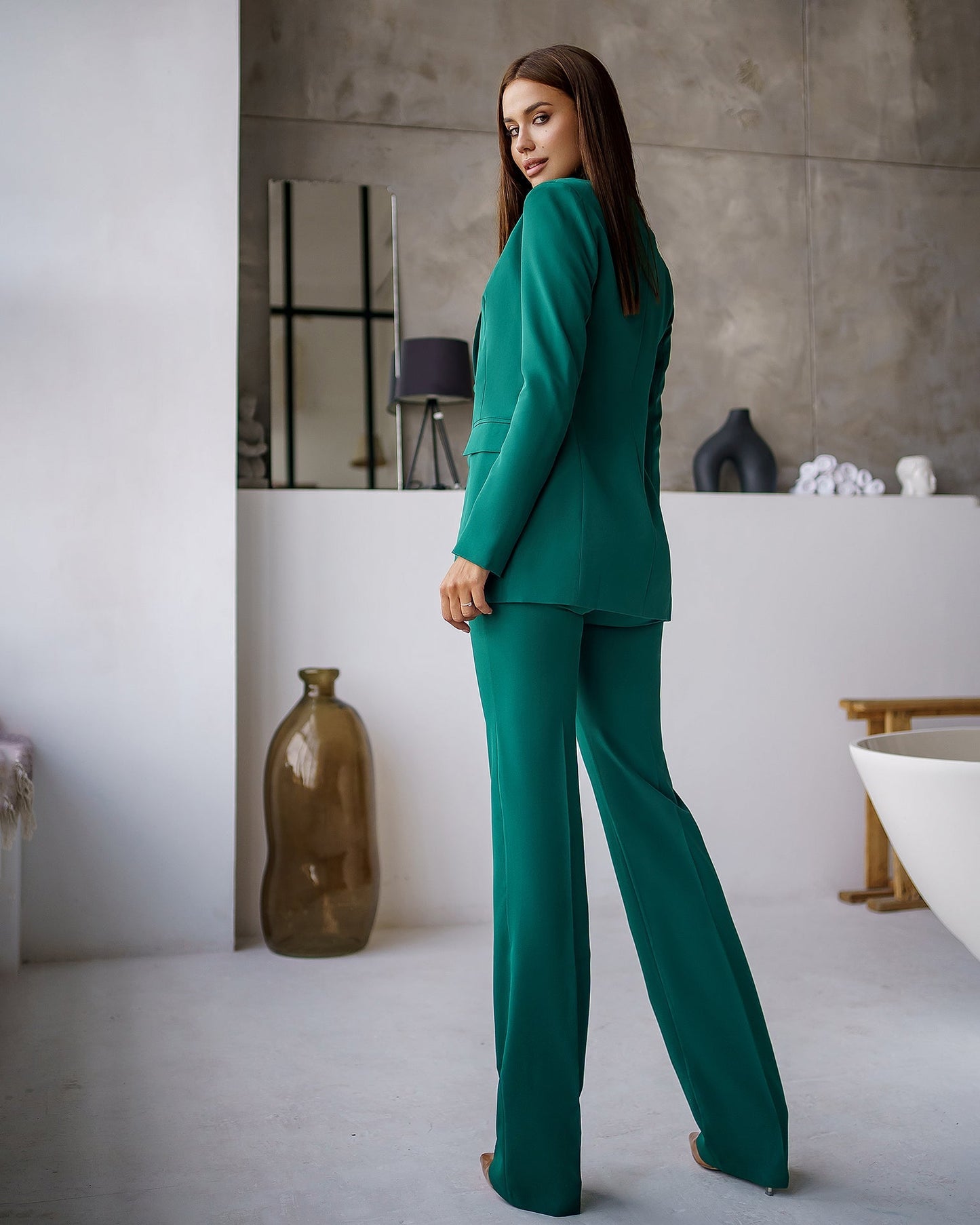 Green three-piece suit with waistcoat and straight trousers