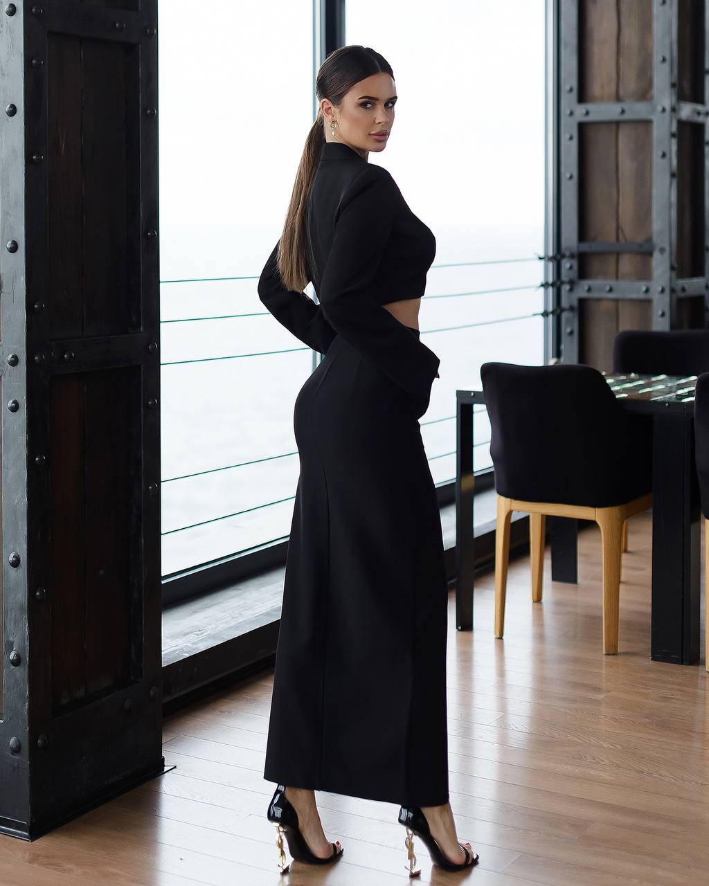 Black pencil skirt with a slit