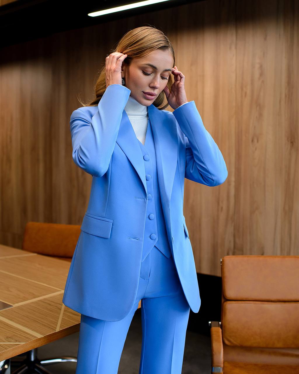 Blue three-piece suit with waistcoat and straight trousers