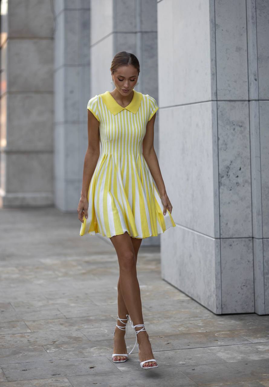 Yellow knitted mini dress in stripes