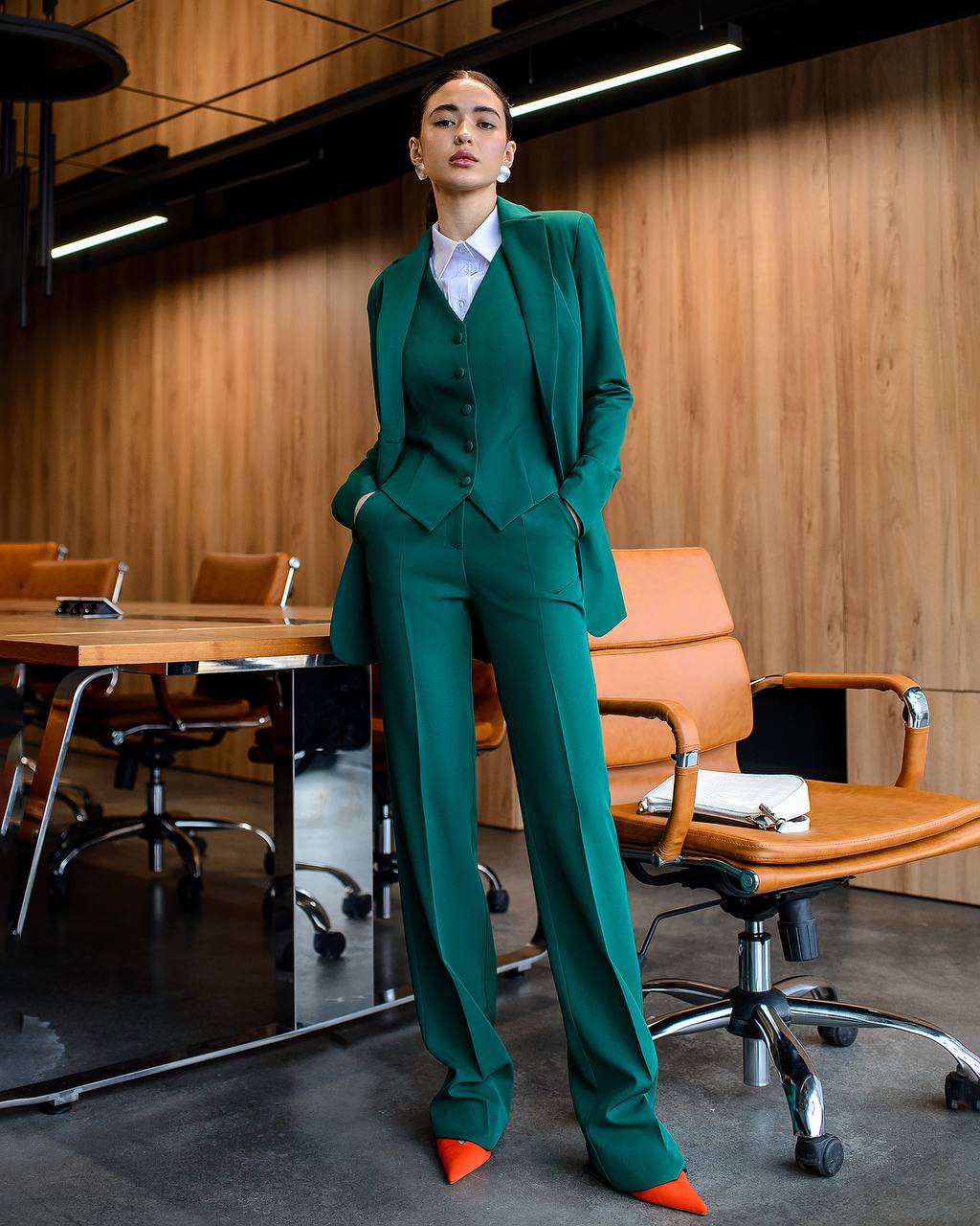 Green three-piece suit with waistcoat and straight trousers