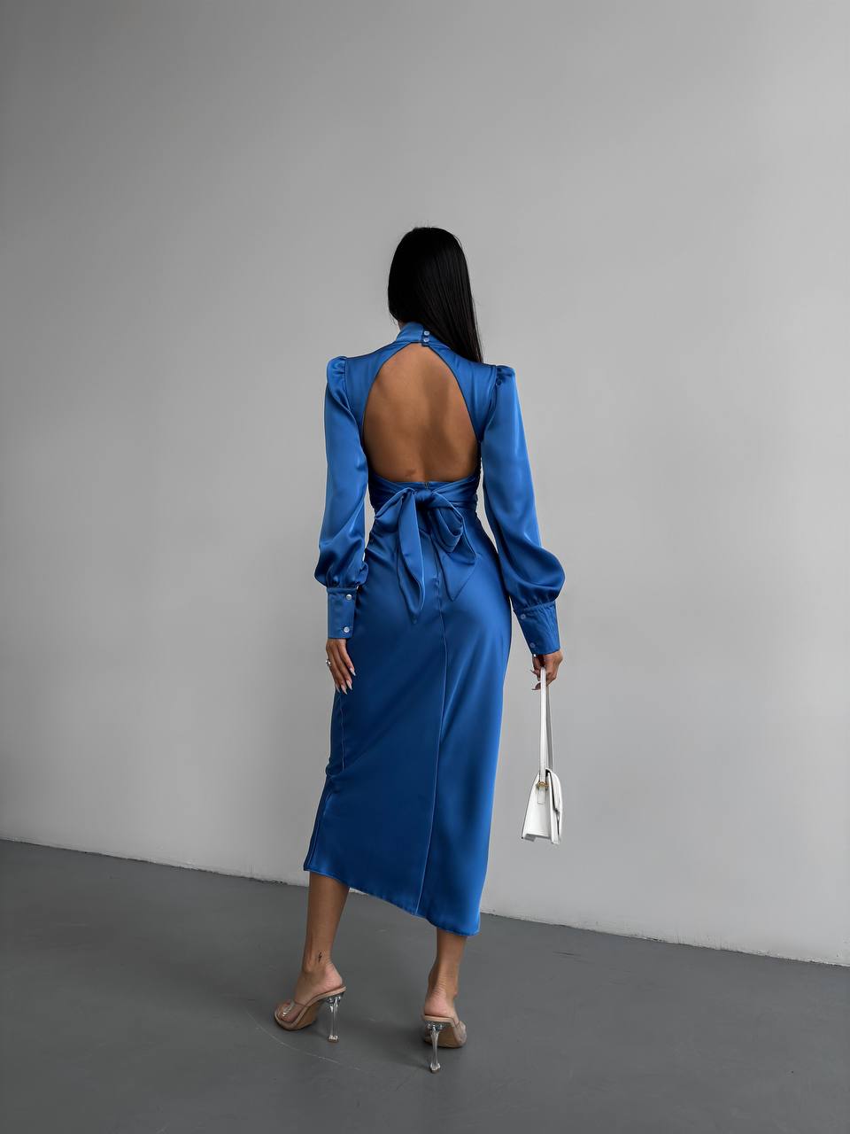 Blue midi dress with bow and open back