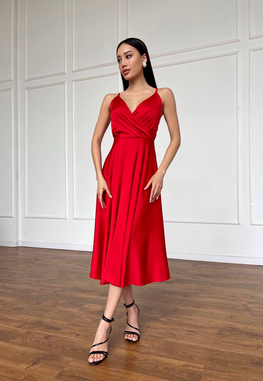 Red dress with an open back and a lush skirt