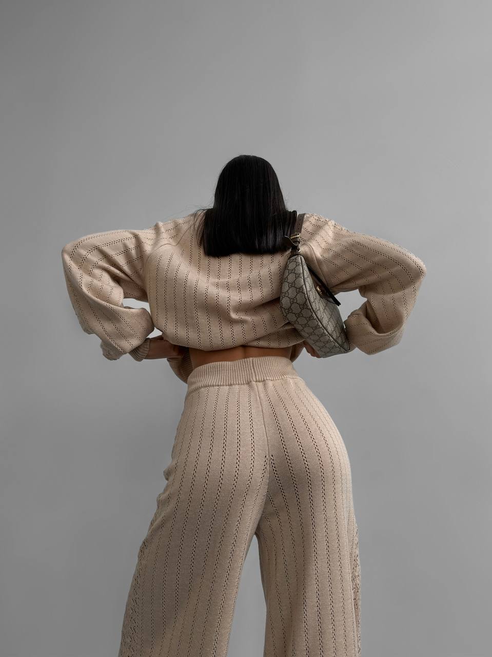 Beige knitted suit