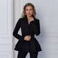 A black suit with a peplum jacket and tapered pants