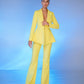 A yellow suit with a peplum jacket and flared pants