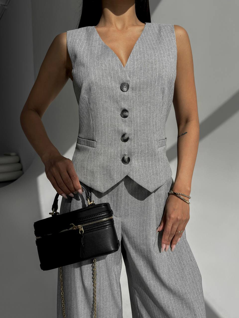 Light gray two-piece suit with vest