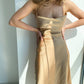 Beige dress-combination with an open back