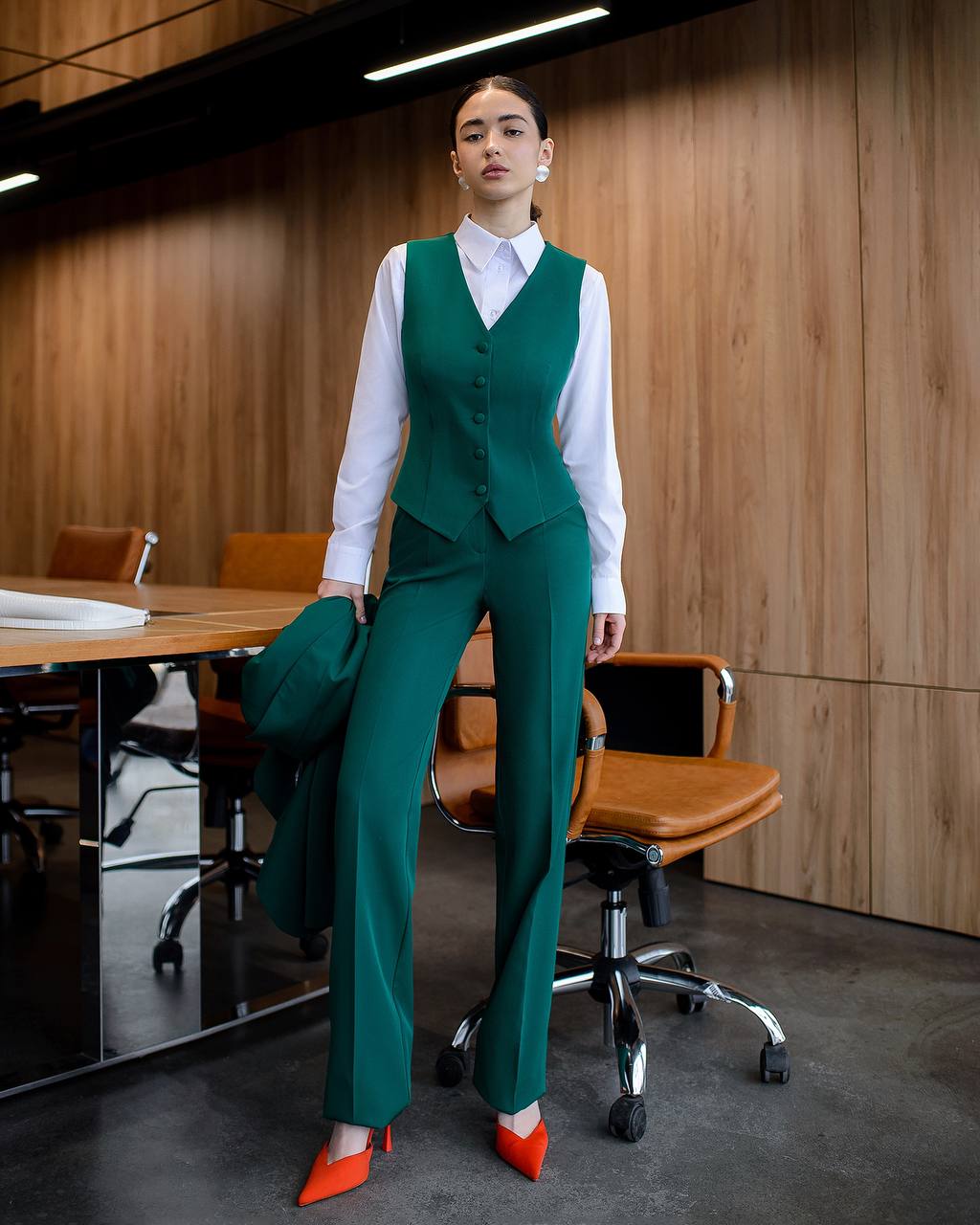 Green three-piece suit with waistcoat and straight trousers