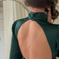 Emerald mini dress with open back and bow