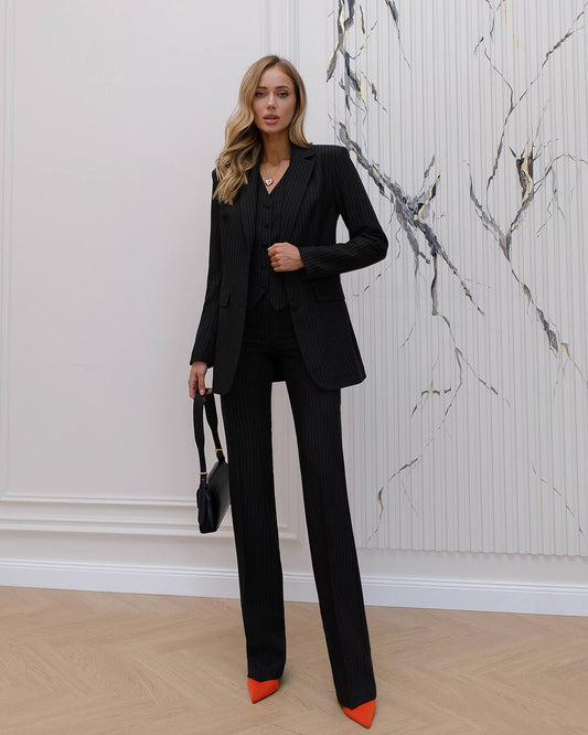 Black striped three piece suit with waistcoat and straight trousers