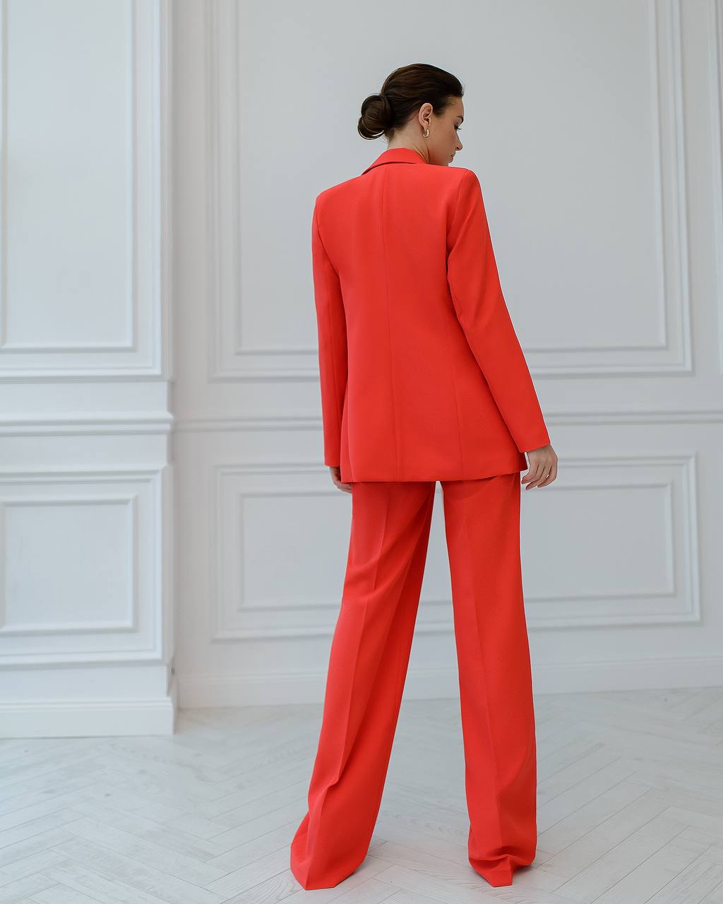 Three-piece coral suit with a top