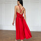 Red dress with an open back and a lush skirt