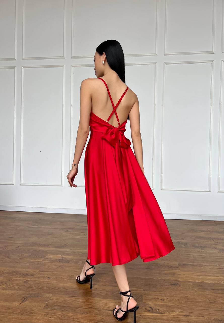 Red dress with an open back and a lush skirt