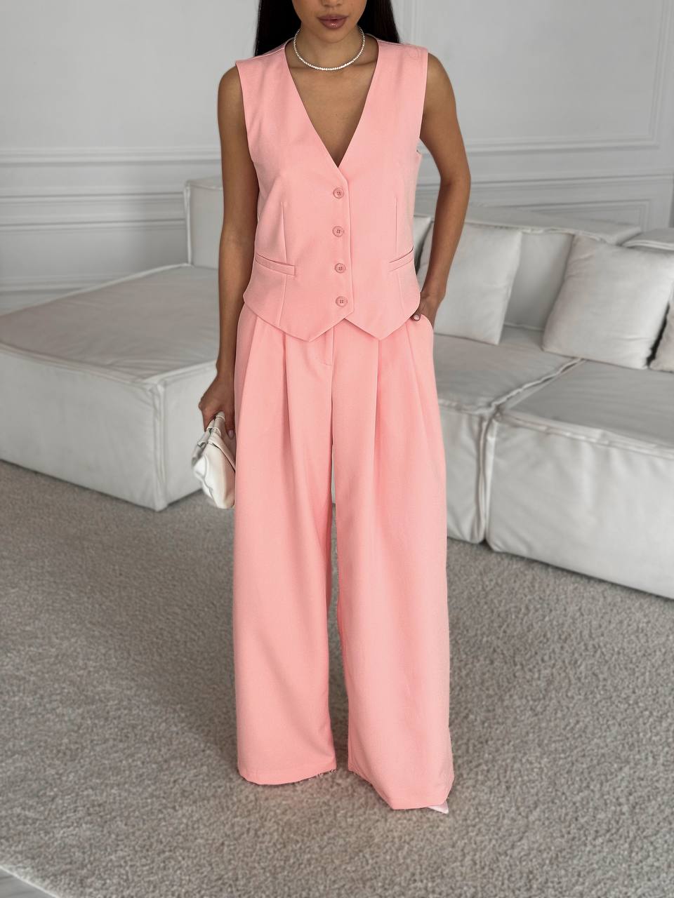 Peach suit for two with a vest