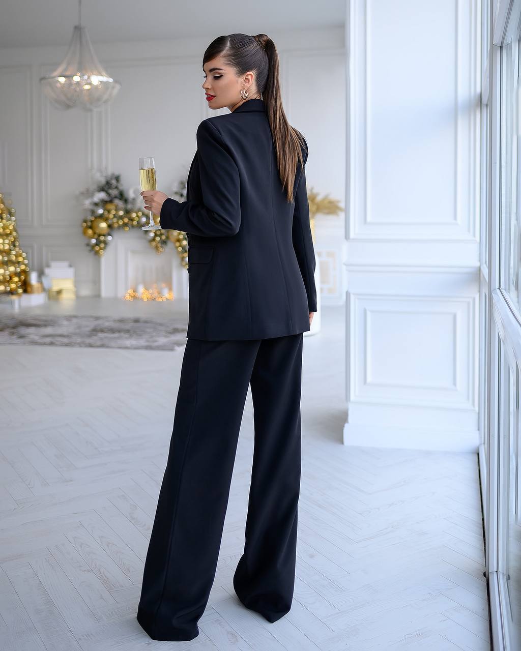 Black three-piece suit with a top