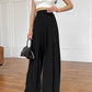 Black pleated palazzo pants