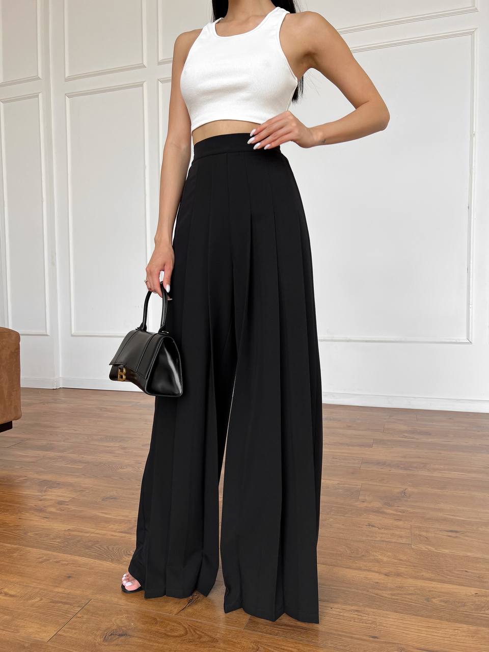 Black pleated palazzo pants