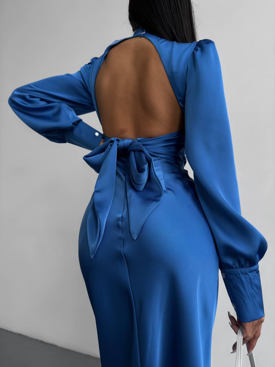 Blue midi dress with bow and open back