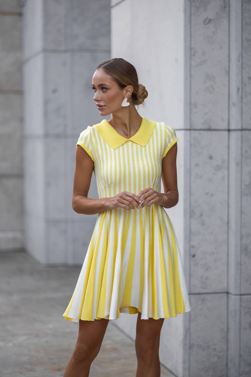 Yellow knitted mini dress in stripes