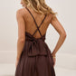 Brown dress with an open back and a lush skirt