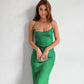 Green dress-combination with an open back