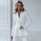 Milk suit with a peplum jacket and tapered trousers