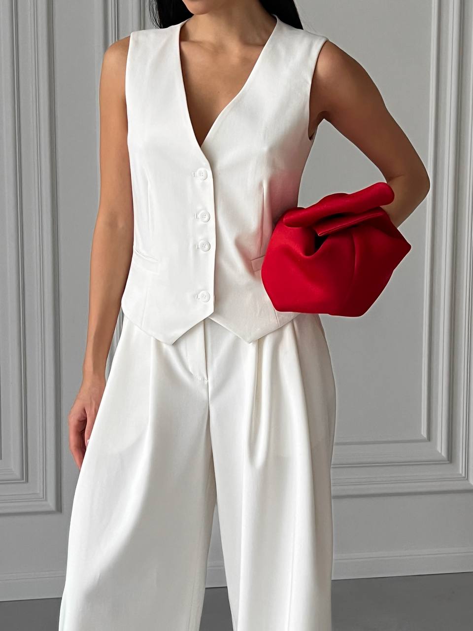 Two-piece milk suit with vest