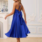 Blue dress with an open back and a lush skirt