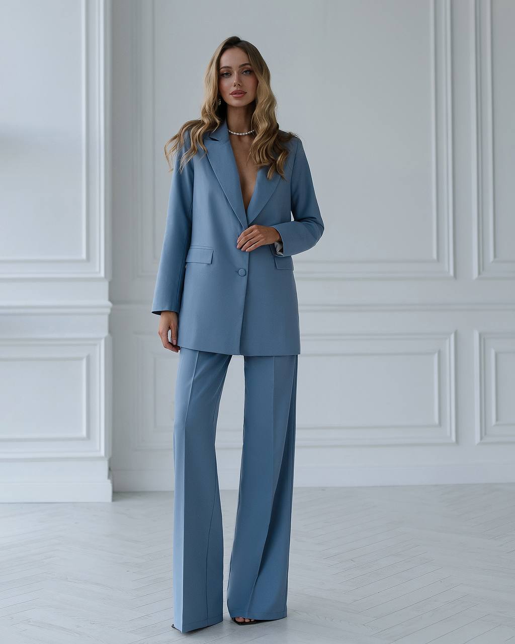 Gray suit with a straight jacket and wide trousers 