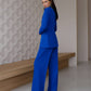 Blue suit with wide pants and belt included