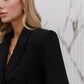 Black suit jacket and flared pants