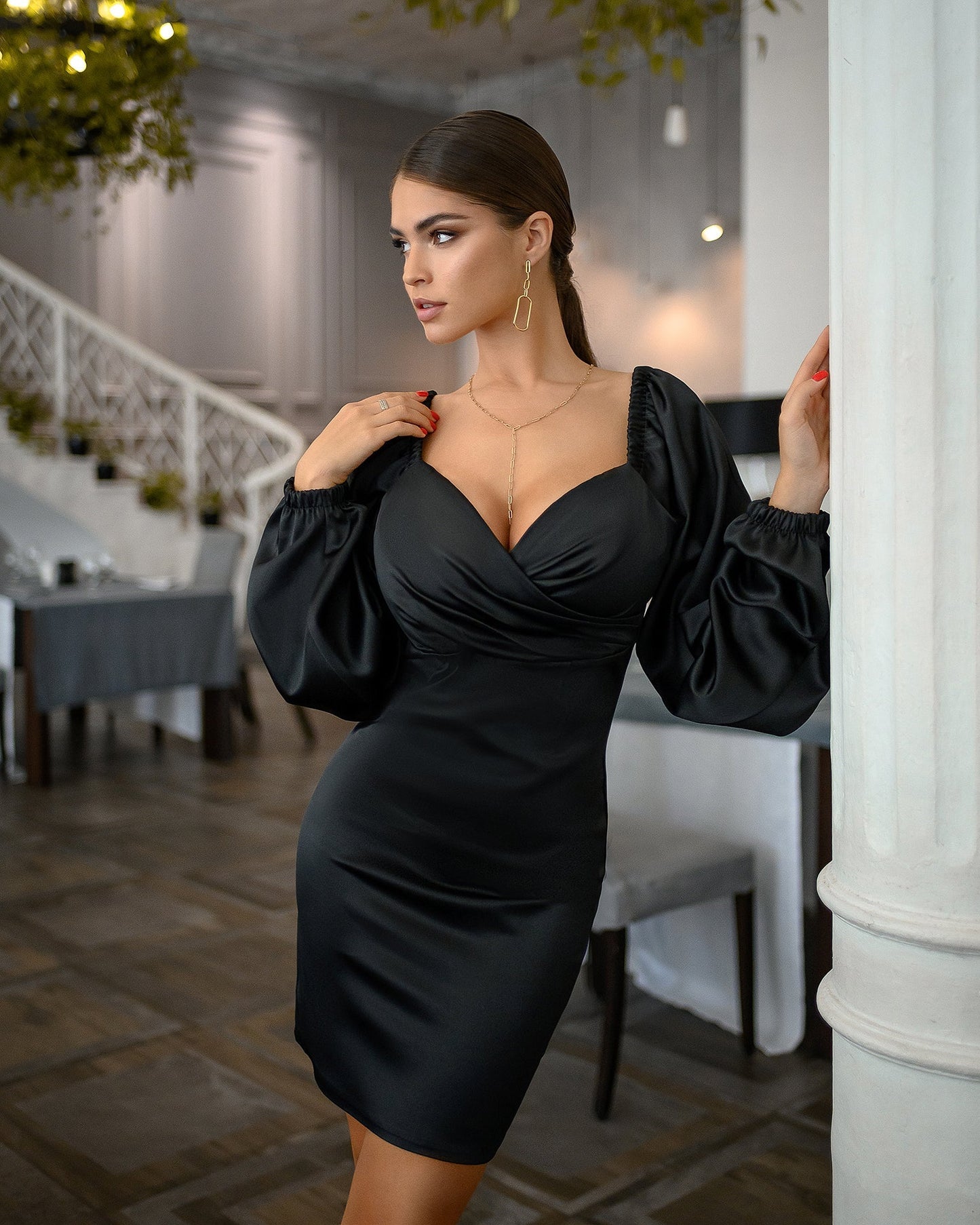 Black mini dress with voluminous sleeves