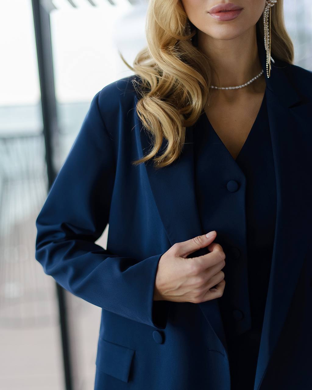 Dark blue three-piece suit with vest