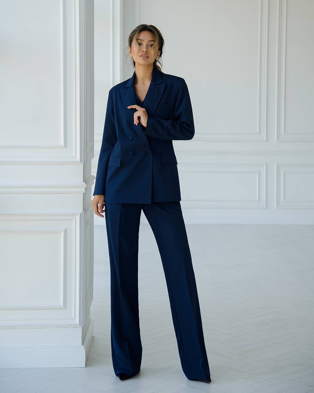 Dark blue three-piece suit with vest