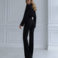 Black suit with a crop jacket and flared pants