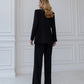 Black three-piece suit with a top