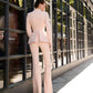 Beige suit with a peplum jacket and flared pants