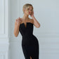 Black corset dress with a slit