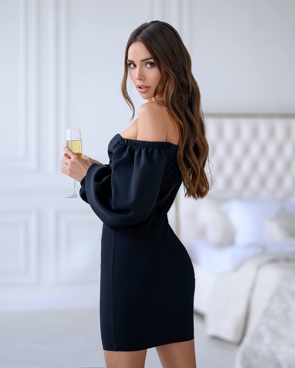 Black mini dress with voluminous sleeves 