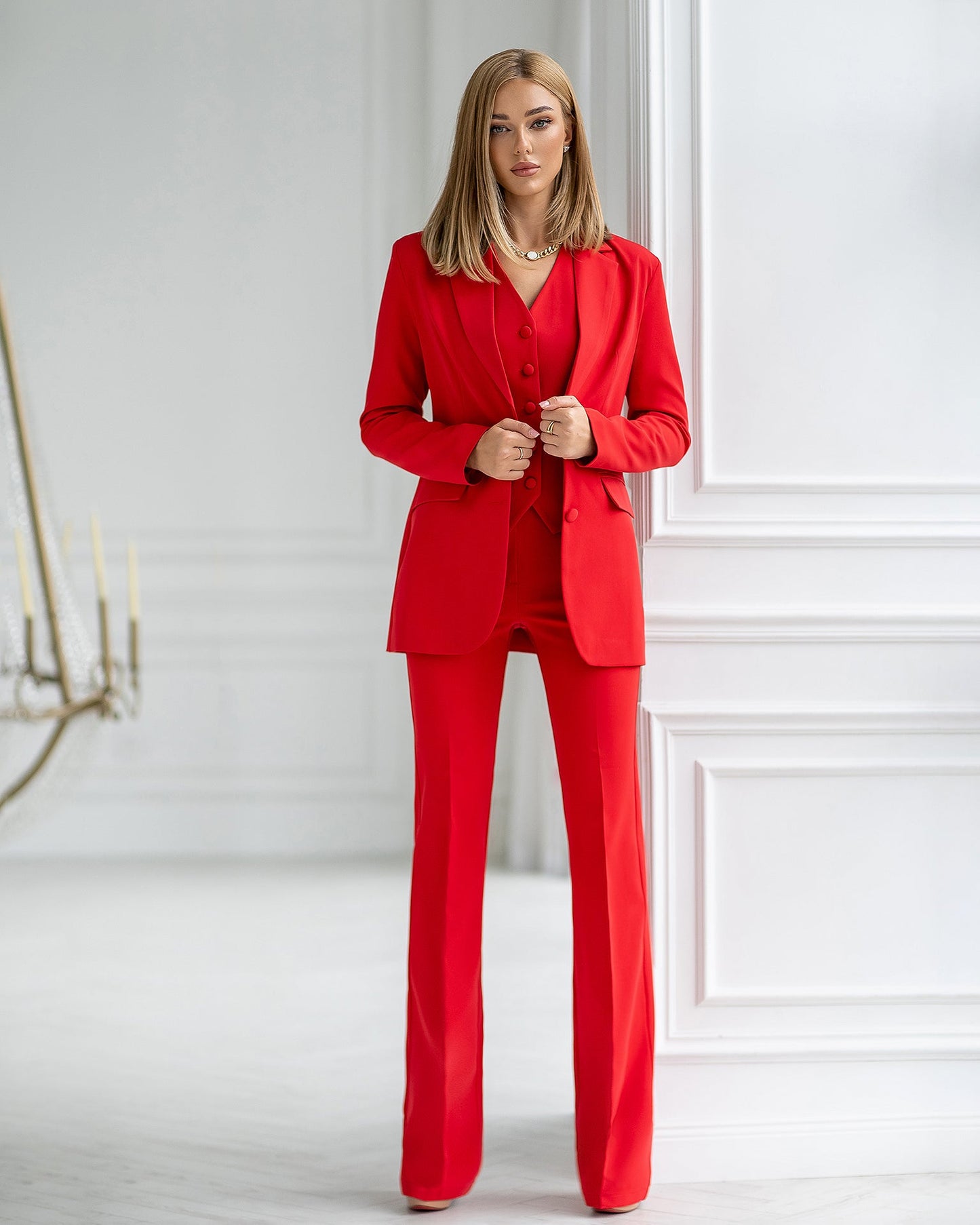 Red three-piece suit with vest and straight pants