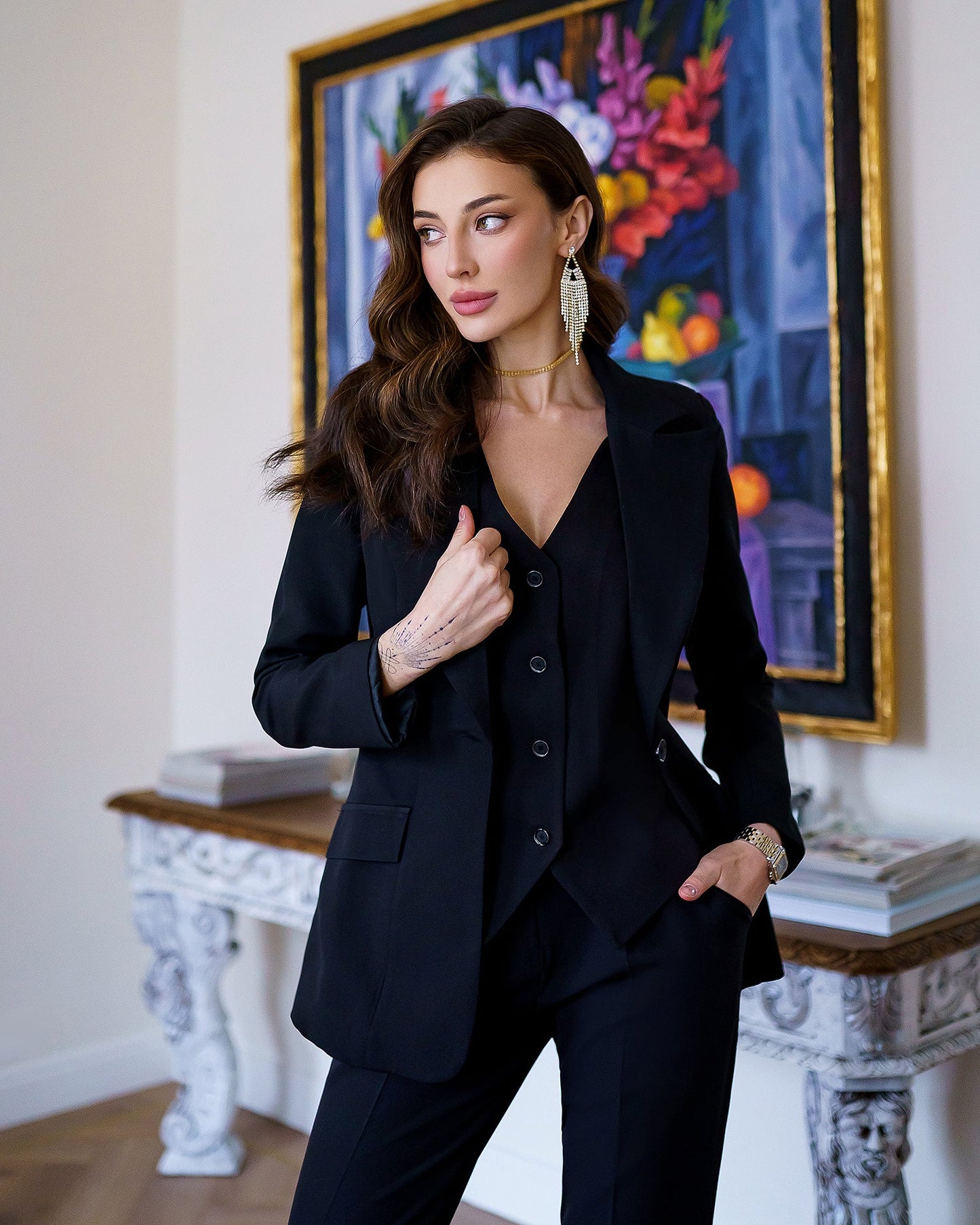 Black three-piece suit with vest