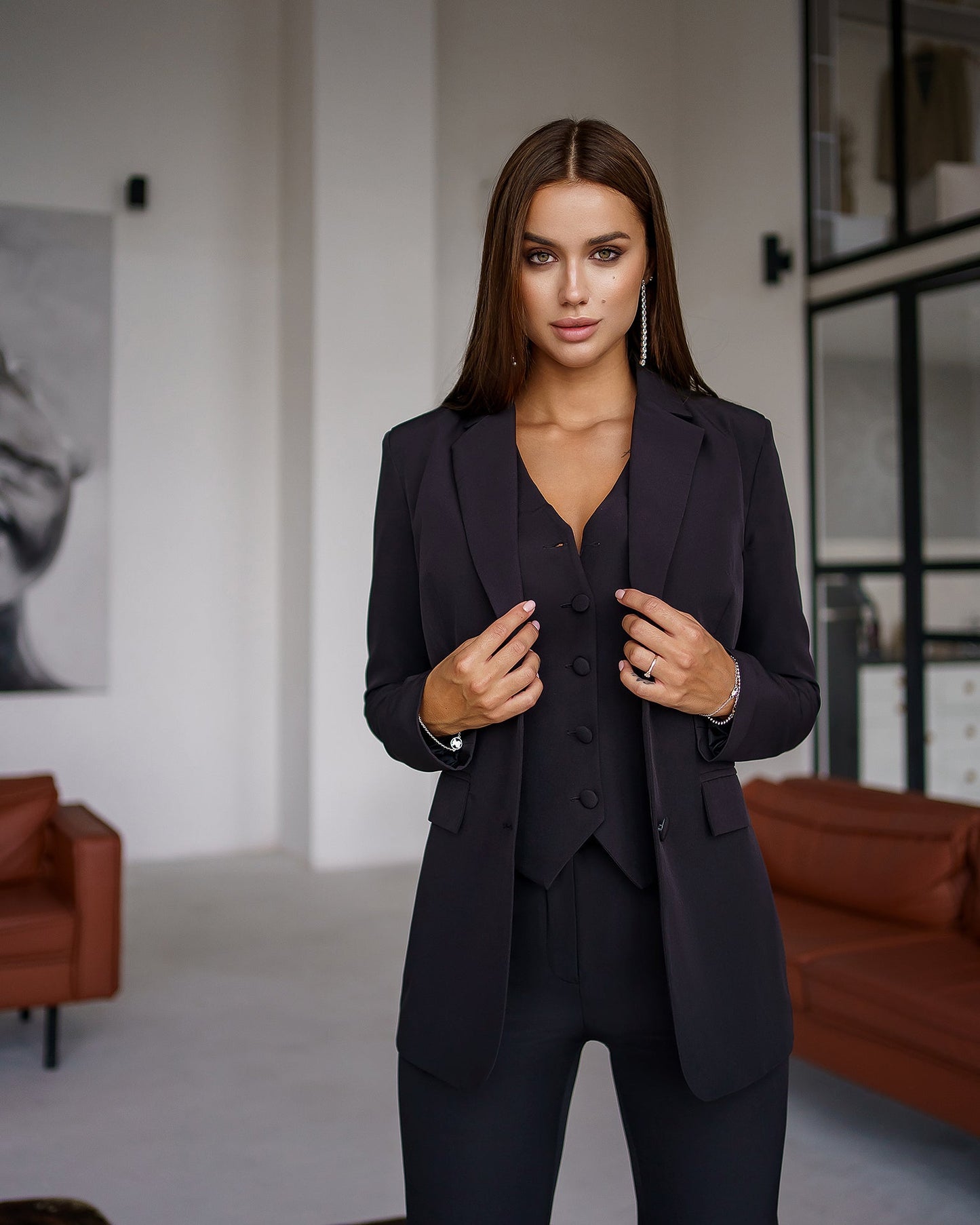 Black three-piece suit with vest and straight pants